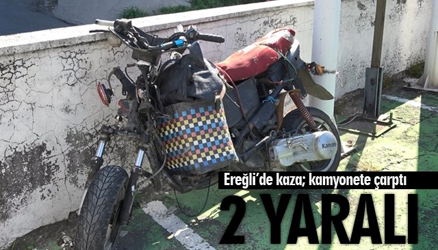 MOTOSİKLET KAMYONA ÇARPTI: 2 YARALI