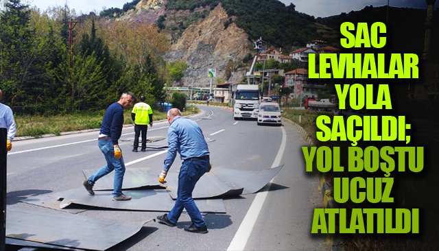 SAC LEVHALAR YOLA SAÇILDI; YOL BOŞTU UCUZ ATLATILDI