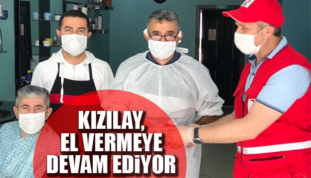 Berber ve kuaför salonlarına maske dağıttı