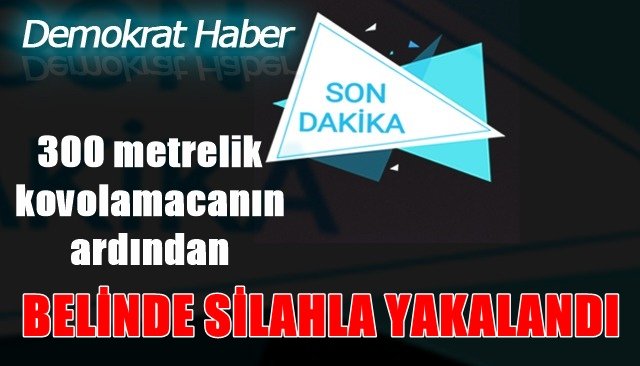 BELİNDE SİLAHLA YAKALANDI