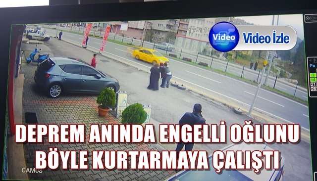 DEPREM ANINDA ENGELLİ OĞLUNU BÖYLE KURTARMAYA ÇALIŞTI