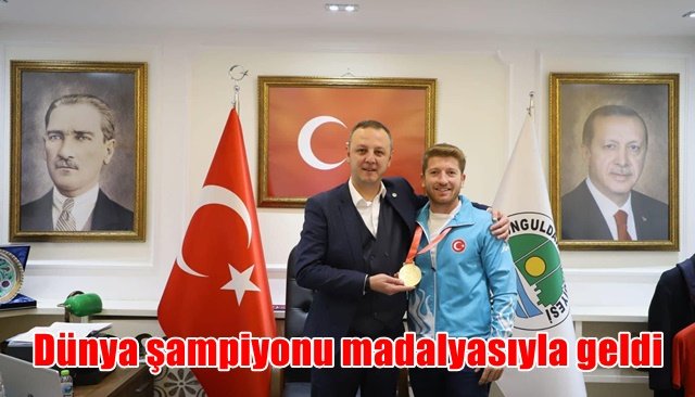 Dünya şampiyonu madalyasıyla geldi