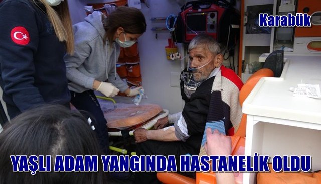  İki katlı evde çıkan yangında yaşlı adam hastanelik oldu