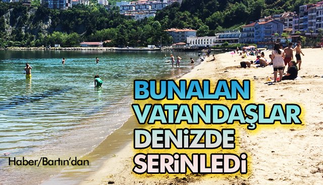 BUNALAN VATANDAŞLAR DENİZDE SERİNLEDİ