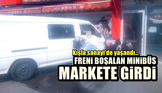 Freni boşalan minibüs markete girdi