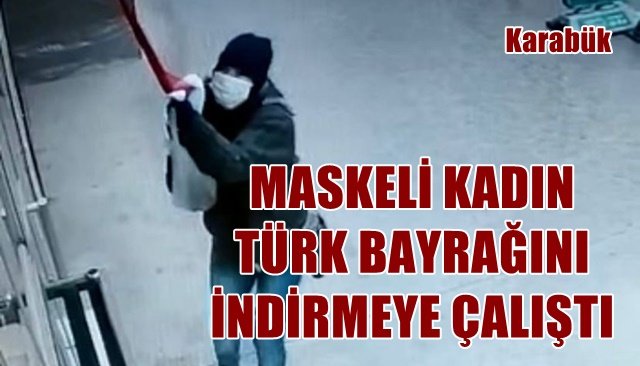 İş yerindeki Türk bayrağını indirmeye çalışan kadın kameraya yakalandı