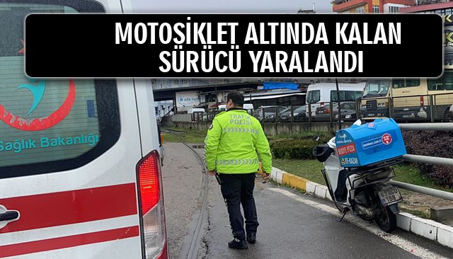 MOTOSİKLET ALTINDA KALAN SÜRÜCÜ YARALANDI