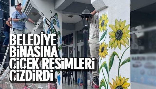 BELEDİYE BİNASINA ÇİÇEK RESİMLERİ ÇİZDİRDİ