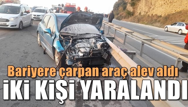 Bariyere çarpan araç alev aldı... 2 YARALI VAR