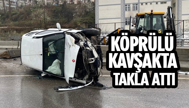 KÖPRÜLÜ KAVŞAKTA TAKLA ATTI