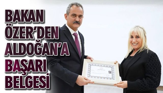 BAKAN ALDOĞAN’A BAŞARI BELGESİ