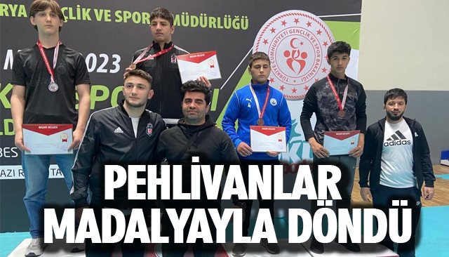 PEHLİVANLAR MADALYAYLA DÖNDÜ