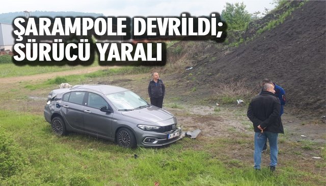 ŞARAMPOLE DEVRİLDİ; SÜRÜCÜ YARALI