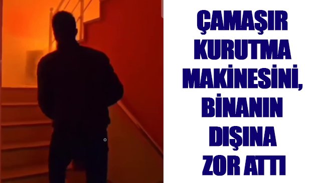 ÇAMAŞIR KURUTMA MAKİNESİNİ, BİNANIN DIŞINA ZOR ATTI